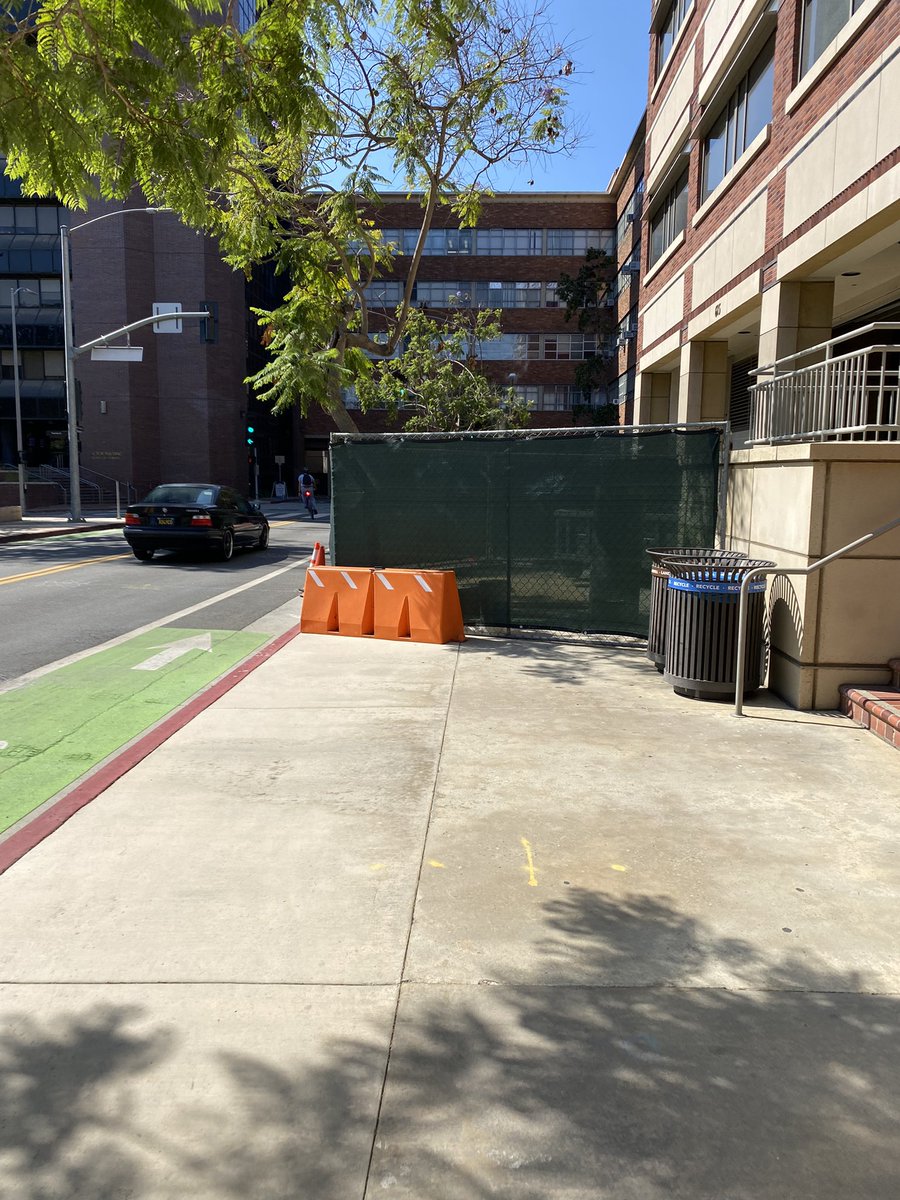 dreaelizabethh's tweet image. two sidewalks at @ucla randomly blocked off, in which a person in a wheelchair would need to turn around, enter the street, and then cross the street to get to the other side of the sidewalk. On the right picture, the gate was blocking/protecting nothing.