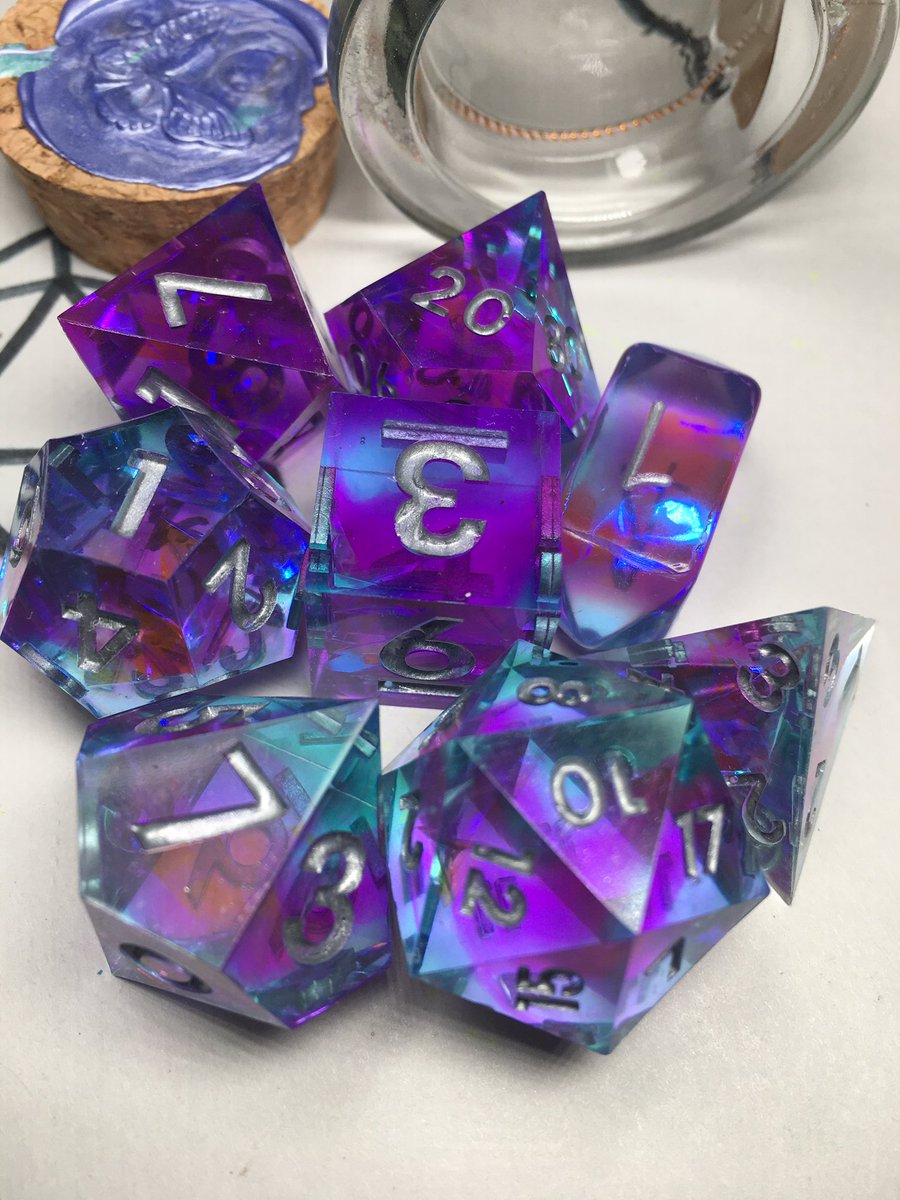 LetoAnimas's tweet photo. Here’s just a few of the latest sets I’ve been making. I’ve been finding neat things to go in dice and been going a bit wild 😆 #dice #handmadedice #resin #dnd https://t.co/sPHMjbeNbZ