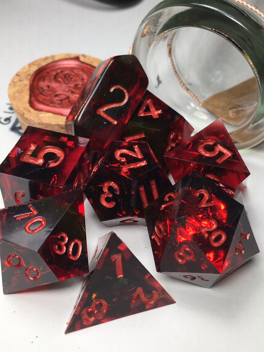 LetoAnimas's tweet photo. Here’s just a few of the latest sets I’ve been making. I’ve been finding neat things to go in dice and been going a bit wild 😆 #dice #handmadedice #resin #dnd https://t.co/sPHMjbeNbZ