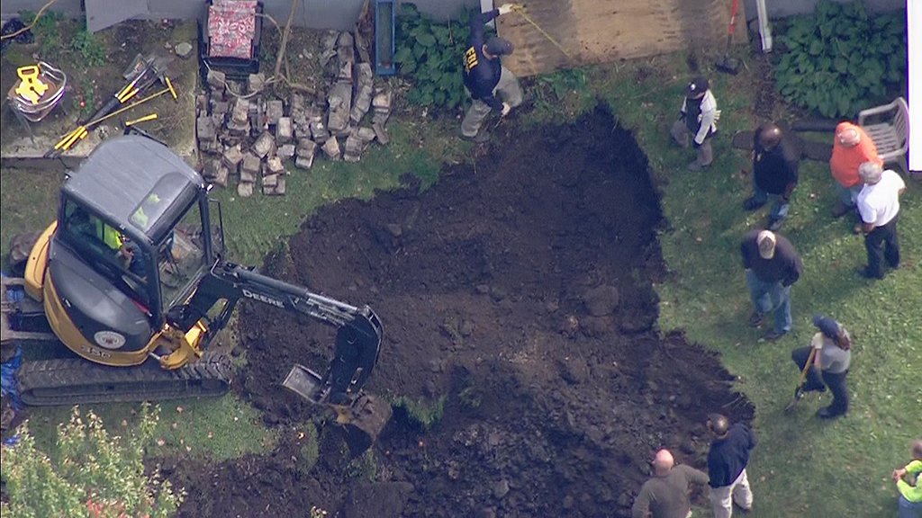 wbz's tweet photo. FBI Digs Up Yard Outside Randolph Home In Evidence Search https://t.co/bbQCjXy5yr https://t.co/UQzN9JoFYL