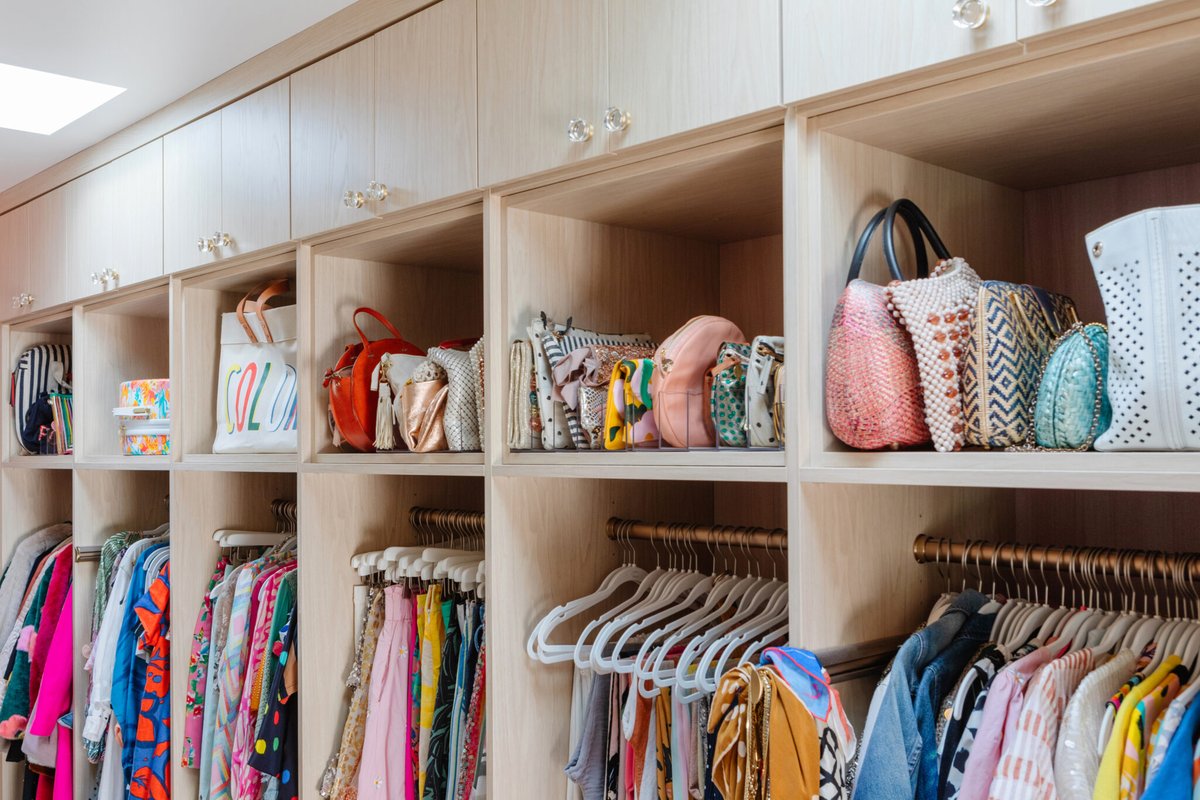 ohjoy's tweet photo. My...I mean OUR...favorite room in the house is the main closet.  And yes, I left a little corner for my husband! 😂 @caclosets #CCCollab https://t.co/tNIb7fZhXV