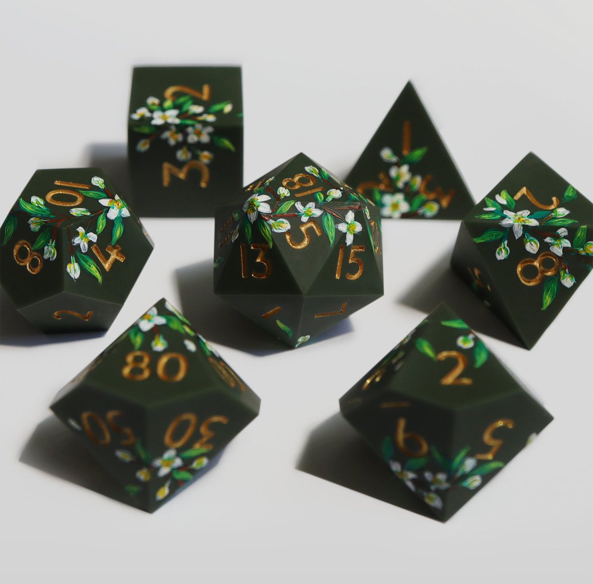 EVERYTHINGDICE's tweet image. WALLFLOWER is our newest hand-painted design, featuring elegant floral illustrations on subtle olive green matte dice. 🌿 Available for preorder on our webstore starting today! #dnd #ttrpg #dice