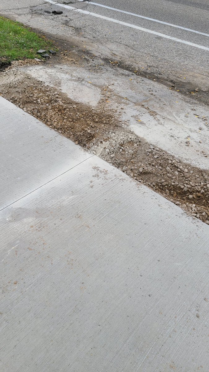Paulman1992's tweet photo. Your goons didn't fix our driveway at all, they tore up the end of our driveway (,our property) without permission and put gravel down. That's not fixing it! That's a half assed attempt by lazy workers! This community is pisssd and sick of your Worker! @CityKitchener https://t.co/4jJpMqZLIh