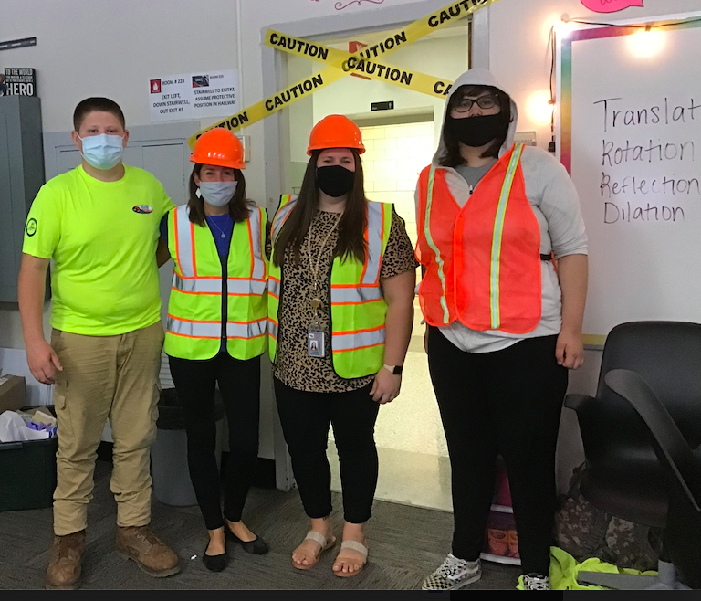 Mrs_Leman_SMS's tweet photo. This is the first time that we had students dress in theme with us! Ryan even wore his construction boots! So fun to bring real world connections to math! @LagankeMegan #onceacard #teachacard https://t.co/uYcBsjaggp