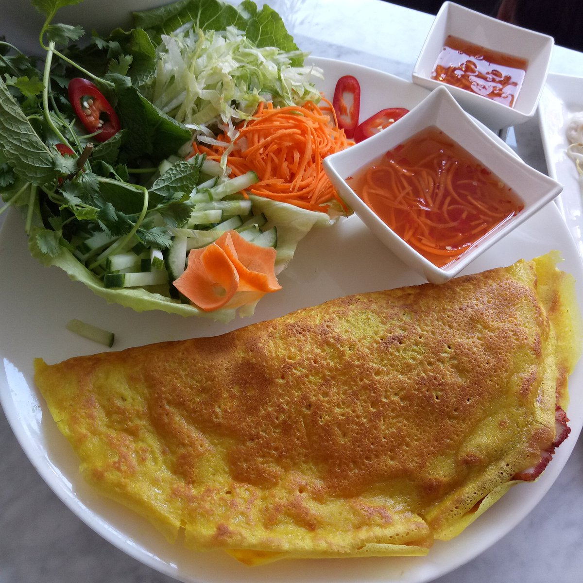 MissCryptoViet's tweet photo. Watching Bitcoin and enjoying Vietnamese pancakes. https://t.co/w6fe8Jn78K