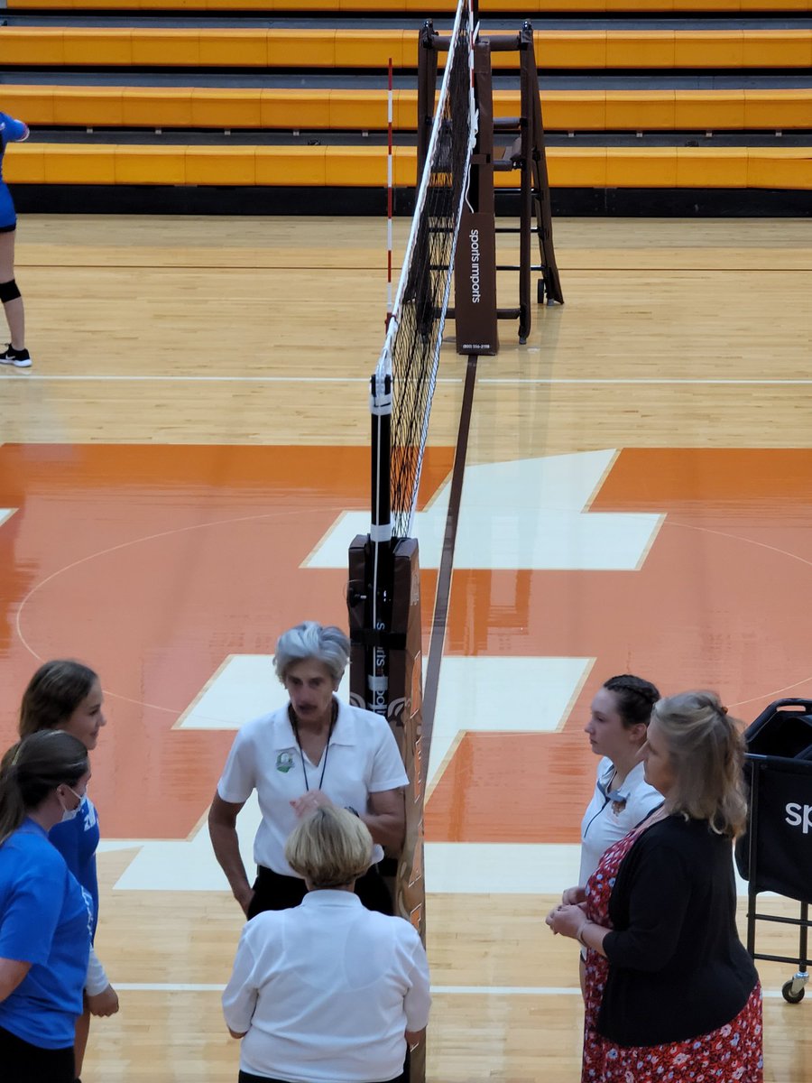 OhioStorm06's tweet photo. Teammates face off in HS volleyball. Look how serious they are at captains meeting. @addyantonetz @cadence_71 @KyndallSpicer https://t.co/a8hw3aoTZS
