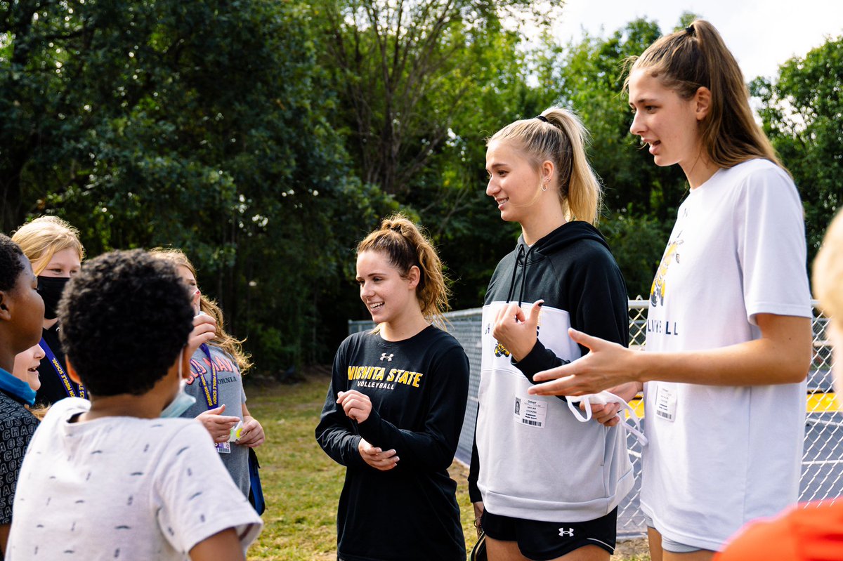 GoShockers's tweet photo. #WellnessWednesday recess break.

Volleyball student-athletes stopped by Robinson Middle School for some physical activity and talk about the role exercise can play in mental health. 

#Pow6rfulMinds x @American_Conf https://t.co/pHLlthBcKD
