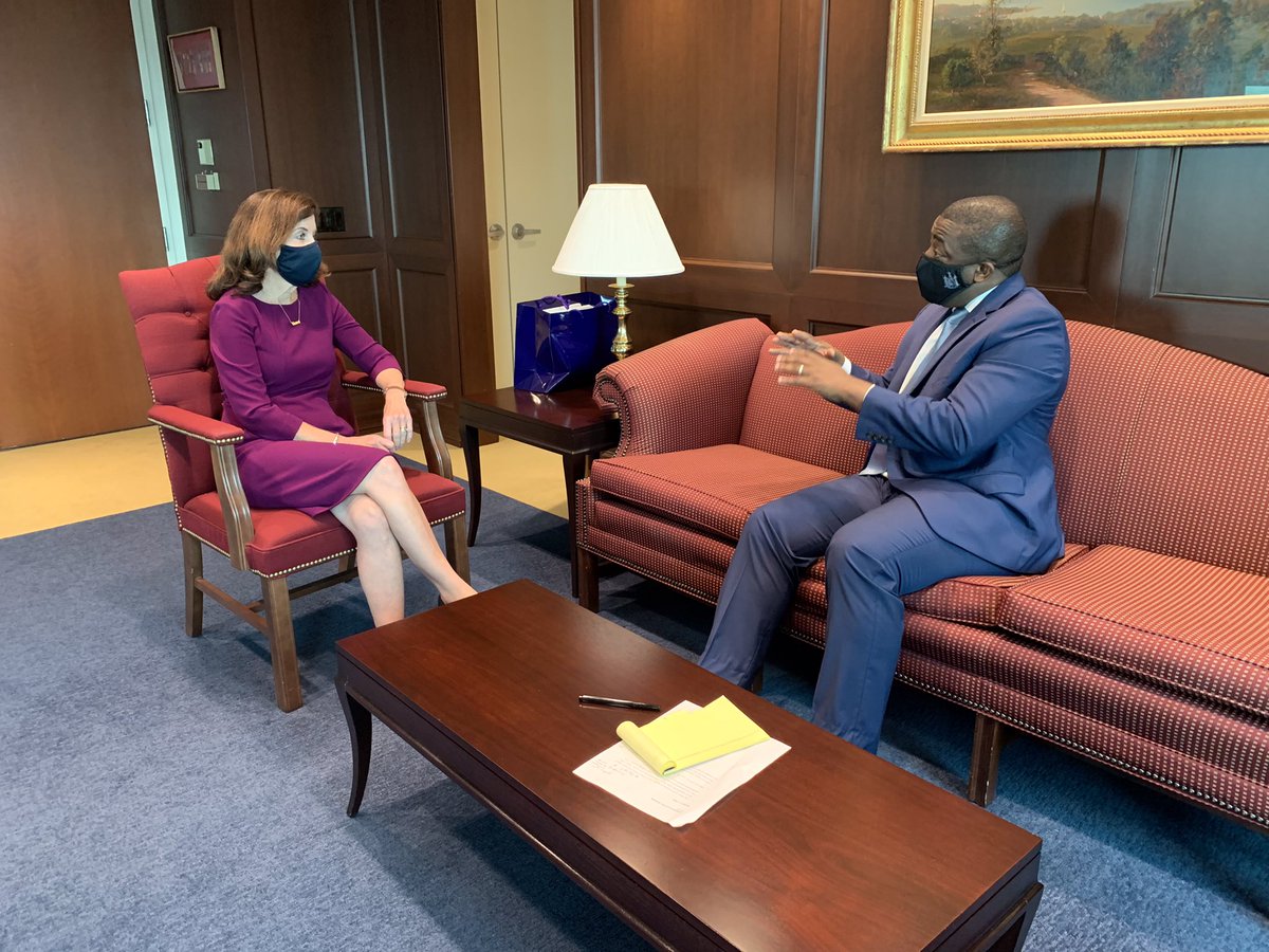 Governor Hochul (left) sitting talking with Lieutenant Governor Brian Benjamin
