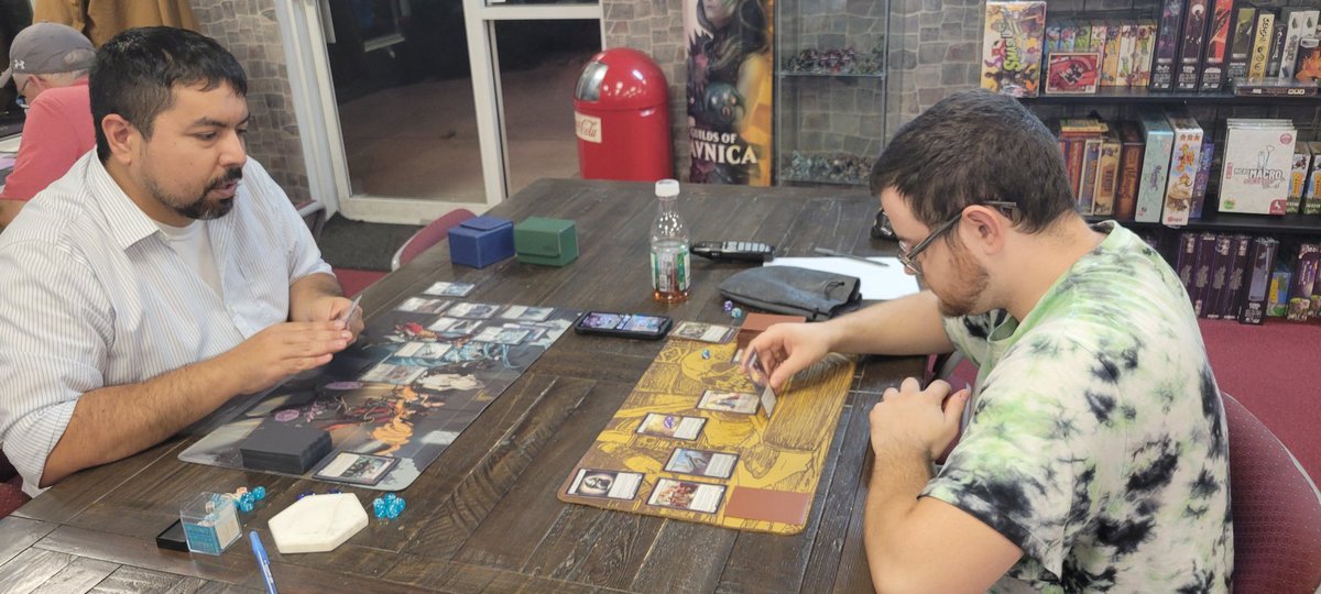 ConArmour's tweet photo. Look at Tim teaching Flesh and Blood. YOU GO TIM! 
Look for Tim( on left)  at Armourcon  running our Flesh and Blood events!
Also, say Hello to our Employee Ethan! https://t.co/YCYrjAnHqc