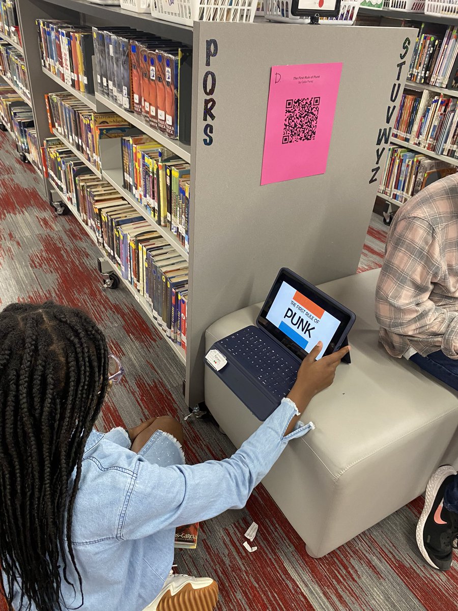 WGILibrarian's tweet photo. Students used QR codes to explore book trailers of books that have won the Pura Belpre award to celebrate Hispanic Heritage month! @woodgatemisd #WGILibrary https://t.co/JJByTr2BBK