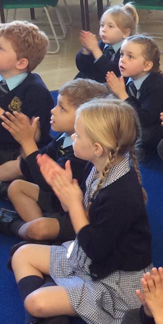 StJohnsWGce's tweet photo. In Year 1, we’ve been enjoying our new phonics scheme: Essential Letters and Sounds. We use fun ways to help us hear the sounds in words so we can spell them, including speaking the word into our hands, warming it up, using our stretching hands and then our robot arms. 🤖 https://t.co/ABApjB9ba1