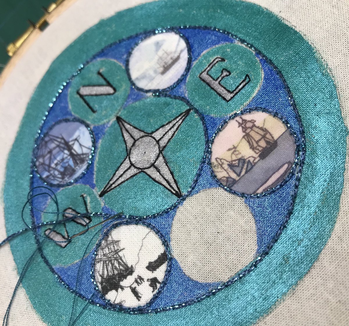 CarolineHack's tweet photo. This morning I’m mostly #couching some sparkly onto the front of my volvelle the blank circle will be cut out to reveal a ring of small sewn images underneath. #HandEmbroidery #WIP #IAmSewing https://t.co/BW791mboBz