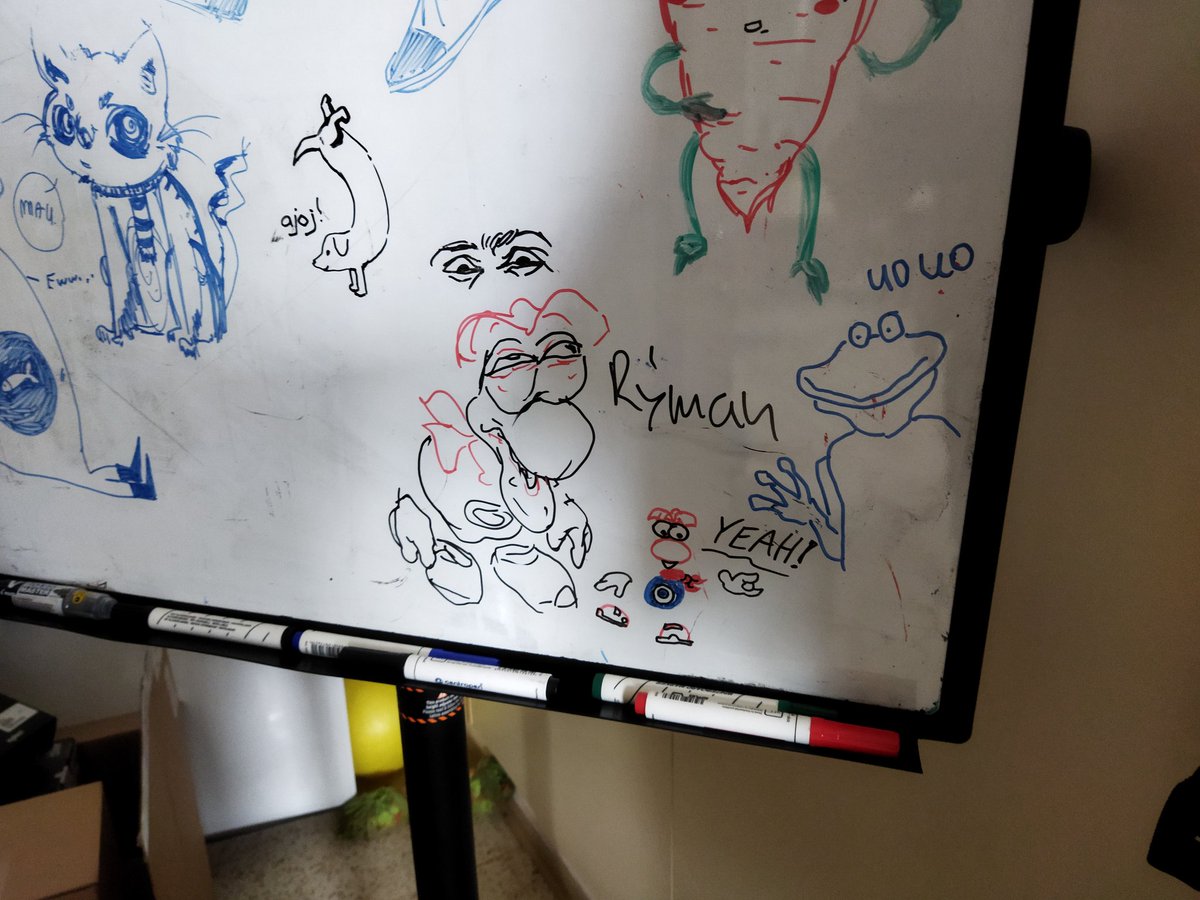 raybloom's tweet photo. Yesterday I drew simple Rayman on whiteboard and a day later I noticed another Rayman and Globox surrounding my drawing. I love this place. https://t.co/pvhRnJPBRA