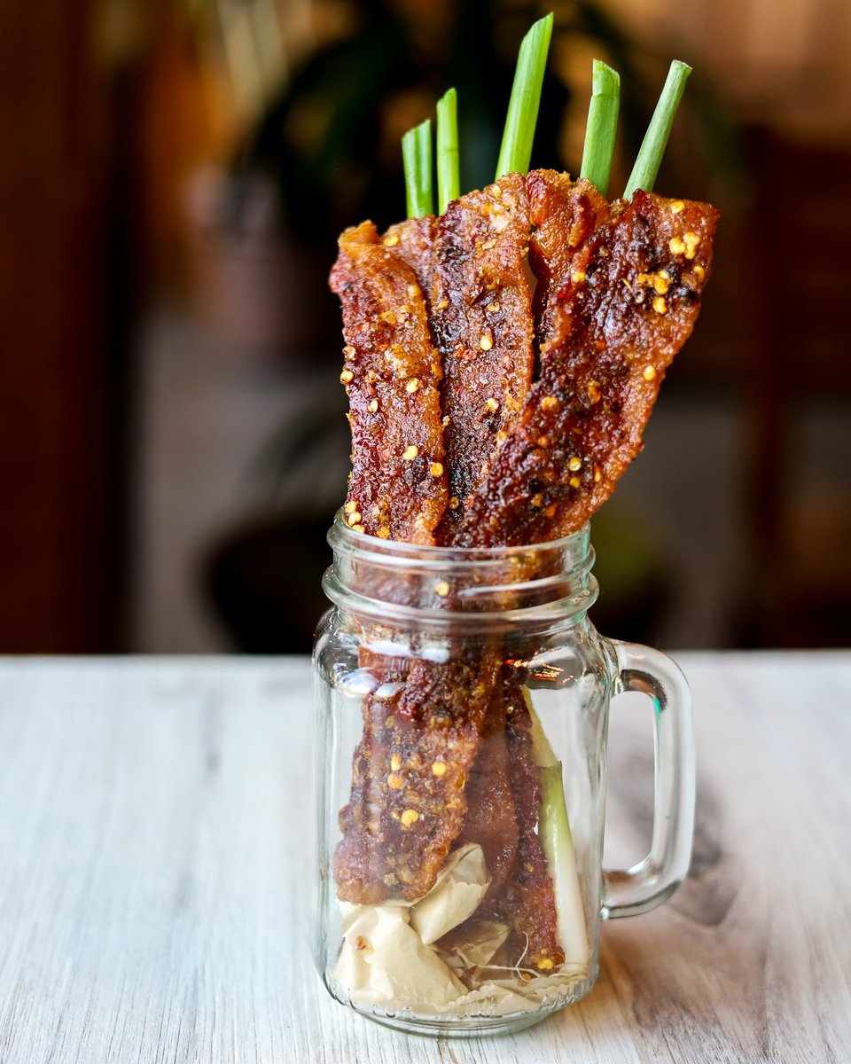 Bacon it to the next level 🥓 Introducing our *NEW* Candied Bacon appetizer with brown sugar, red chili flakes and garlic 🔥