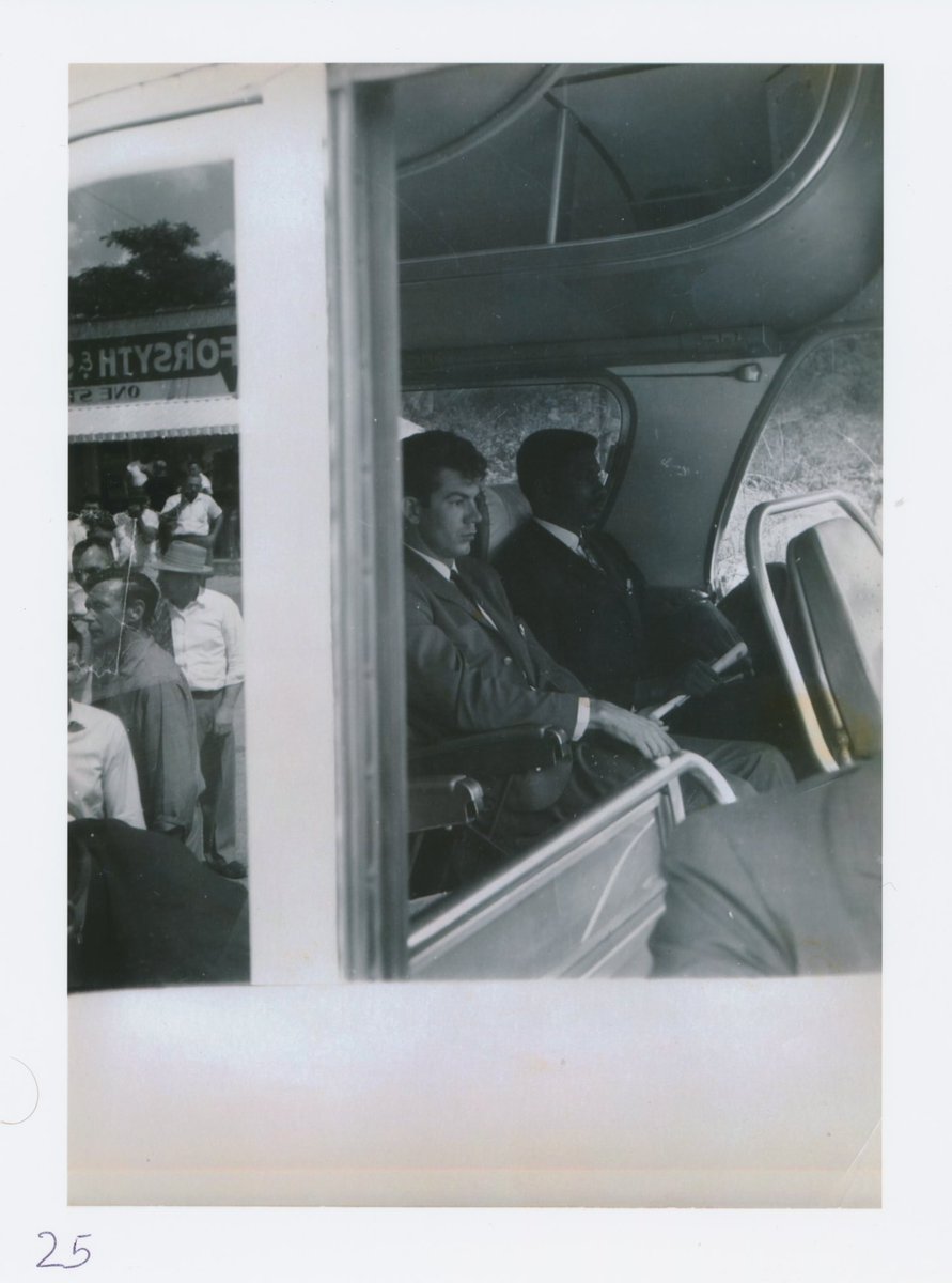 This photo, shared by The Anniston Star, is a remarkable look at the mob attack on the Greyhound bus outside Anniston that Mother’s Day. You see two Riders sitting in the bus, staring straight ahead. If you zoom in, to the left, you candle the crowd of white men standing outside.