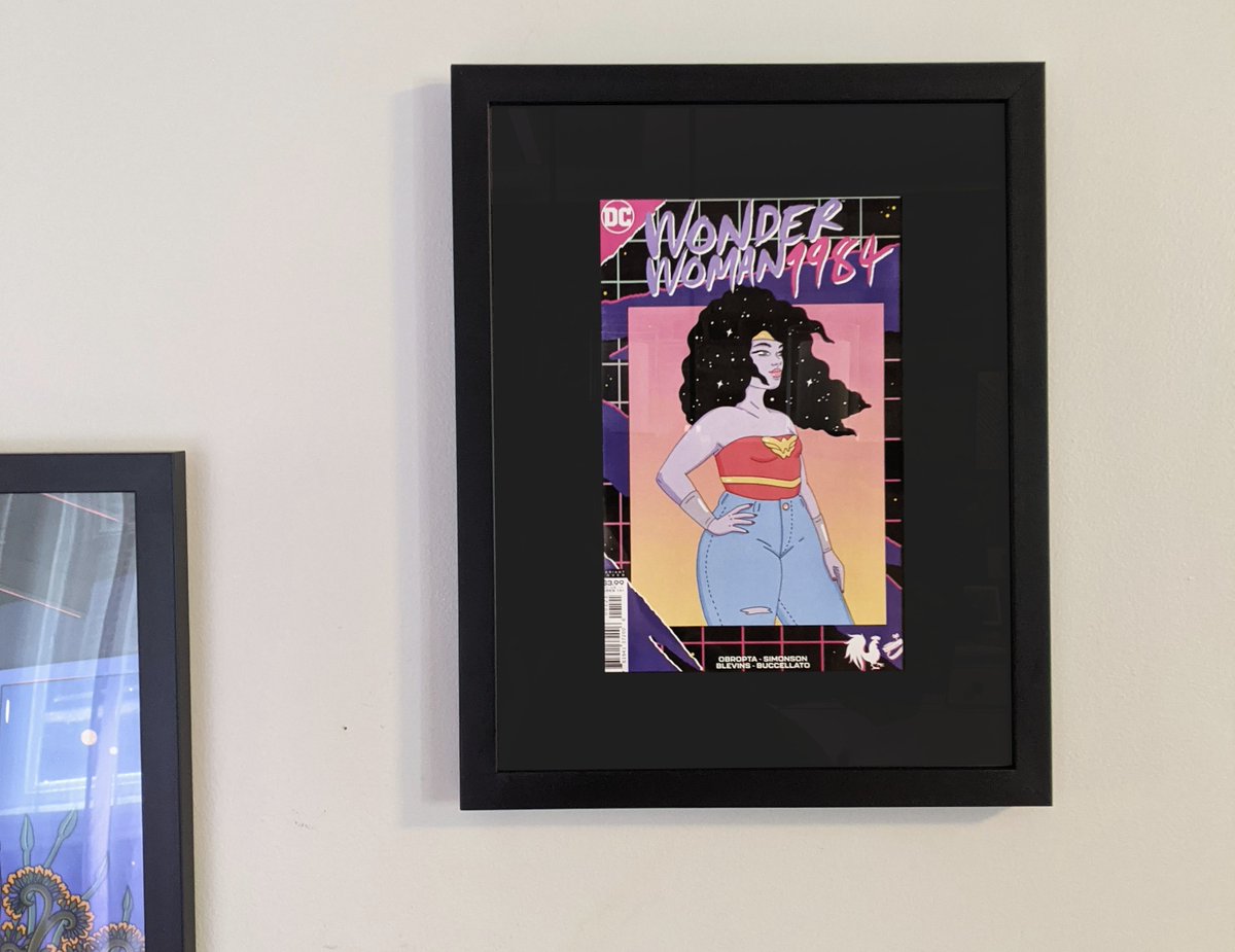 .@eisenbergrobin's Wonder Woman 1984 cover looking great framed on my wall. https://t.co/QeeY4qa152