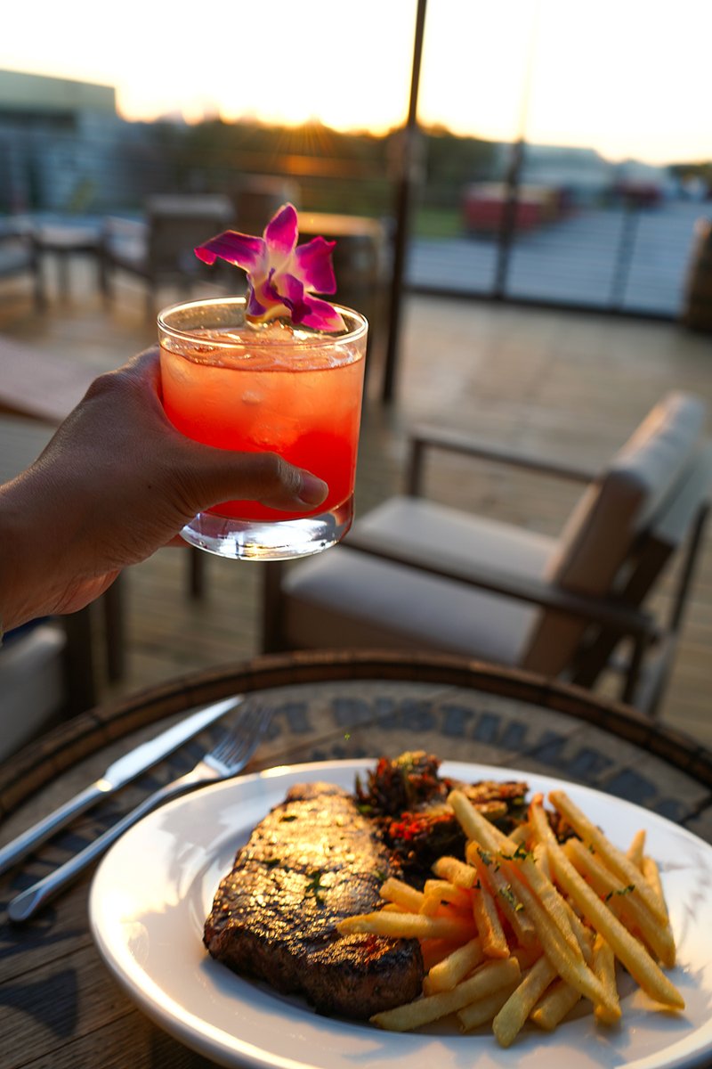 While you're here for Steak Night tonight, enjoy a cocktail on our deck as you watch the sunset over Downtown!