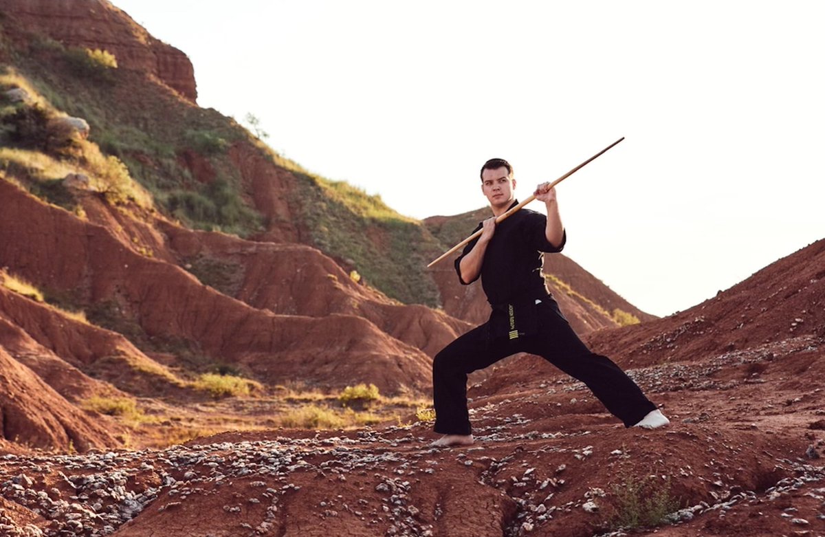 Featured is Black Belt Hall of Fame member, Jackson Rudolph. He innovated his own style of bo for sport karate competition that combines powerful striking with high speed manipulations and difficult tricks. 
Photo Credits: Century Martial Arts