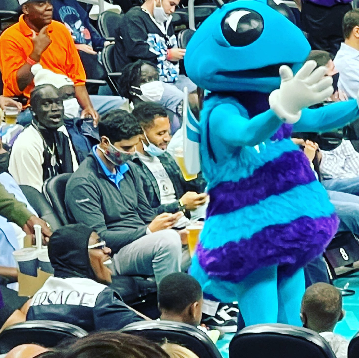 DaBaby attends the game between the Charlotte Hornets and the Los