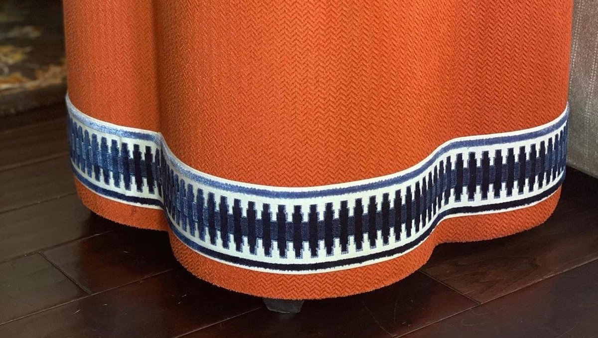 brimarinc's tweet photo. @jhollandinteriordesign takes an inexpensive tuffet up a notch by adding fabulous banding... and tah-dah! A custom feel that everyone loves ❤️

Trim available at @brimarinc (Bolzano Collection). 
#ottoman #trimmings #upholstery #customfurniture #interiors #workroom #trims https://t.co/QjZXwJy8Yg