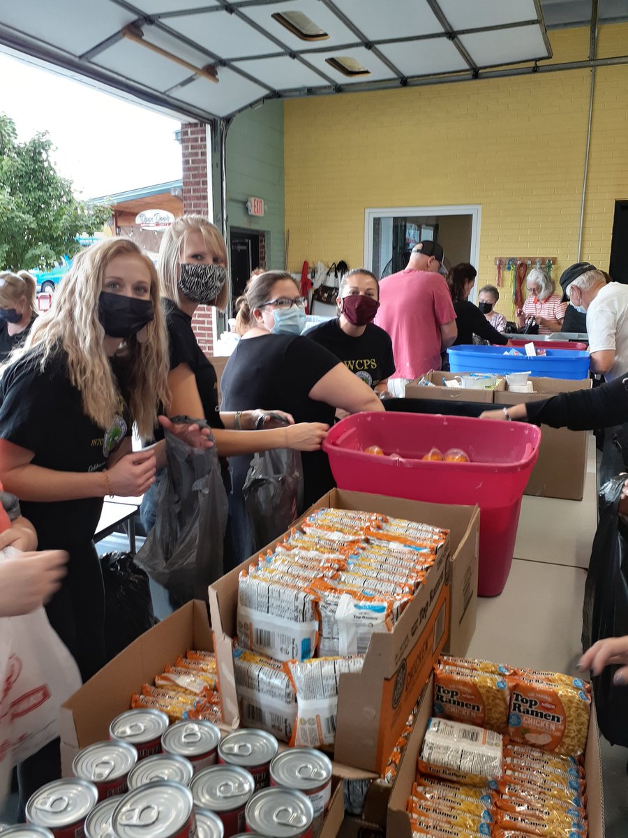 school_scott's tweet photo. Our staff loves our students and our community! SMMS Staff on Wednesday helped pack HOPE Packs that will help feed our students and community. Check out these photos below! #PutALittleLoveInYourHeart https://t.co/Opzb6Ij8KN