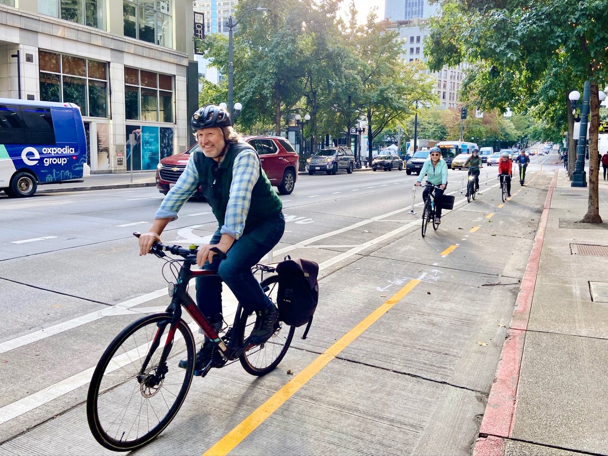 4th Ave now has a 2-way protected bike lane from Belltown to Pioneer Square! SDOT staff who worked on this celebrated with a ride, scoot, and walk along the new route.