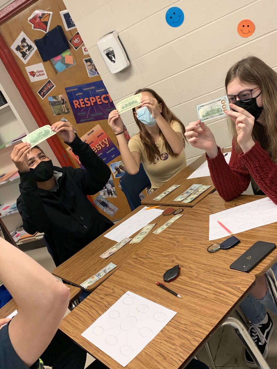 CMSsocialst8's tweet photo. Is it real? Students examine  lots of cash in the classroom! What a fun and engaging way to look for features used to prevent counterfeiting. #CardinalPride ⁦@CMSCardinals⁩ ⁦@ClintonMoCards⁩ https://t.co/khG6vbBNzq