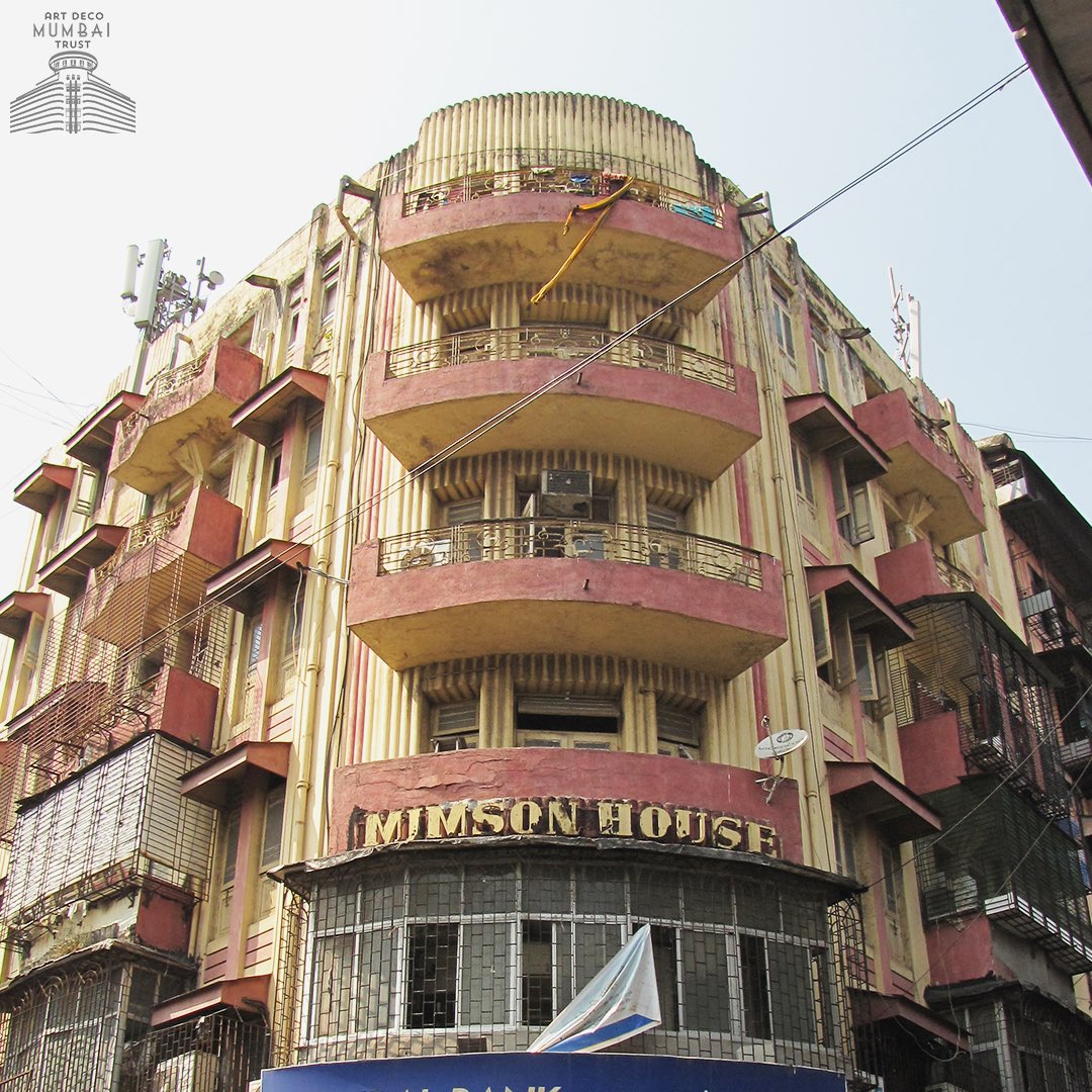 artdecomumbai's tweet photo. #MimsonHouse takes on a #tropicalDeco vibe with its yellow #reeding detail and pink #cantilever balconies. It retains its Deco-ness with the rounded corners but opts for a strong #serif typeface to announce itself. (2/5) https://t.co/wJUS0HyzlV