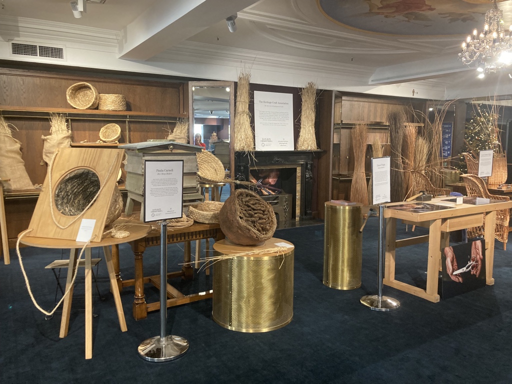 heritage_crafts's tweet photo. In London this afternoon? Why not pop along to @Fortnums 3rd floor to see demonstrations of #HCARedList #endangeredcrafts scissor making @ernestwrightltd, bee skep making @Buzzabouthealth, and basketwork furniture making  @WillowsWetlands. ✂️🐝🪑 @Londoncraftweek https://t.co/Za8Qn4TSj5