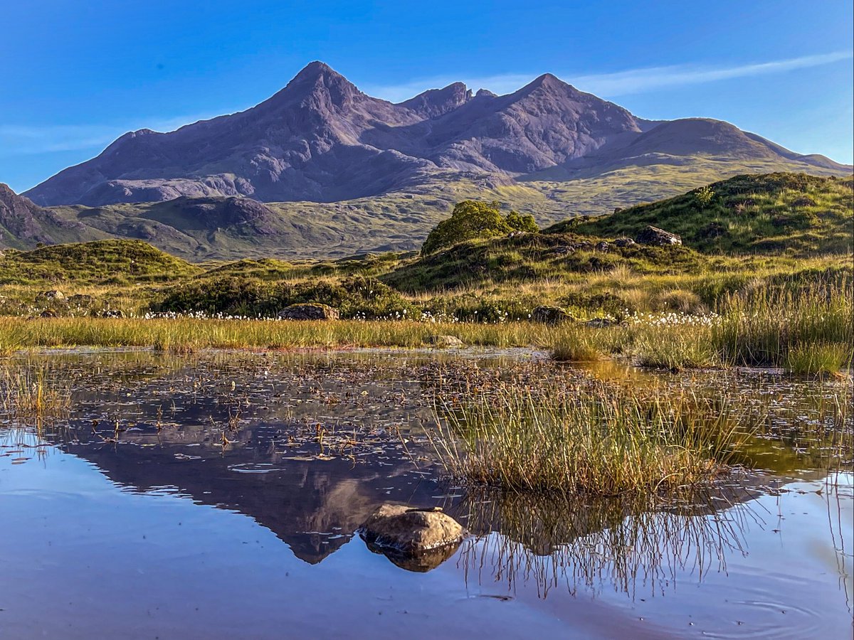 VisionsScotland's tweet photo. #reflections of the #cullin #mountains on the #isleofskye a glorious late summer view. The definition of #tranquility . #scotland #scotlandstartshere #landscapephotography #landscape #visitscotland . Follow us for a daily tweet featuring images of Scotlands scenery and wildlife. https://t.co/oPmVizBD2I