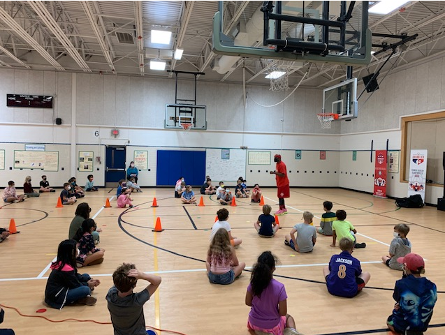 Gr8FallsES's tweet photo. Guess who we met today!?!?!   Former Harlem Globetrotter, Motivational Speaker, and Guinness Record Holder, Corey The Dribbler!  Inspires students with character message, 4R’s 4 Success! Respect - Responsibility - Ready to Learn - Reading is Power.🏀📖💛💙 #FCPSRegion1 #OurFCPS https://t.co/XwH3PtUXqf