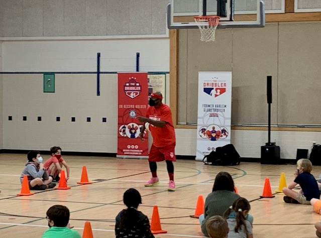 Gr8FallsES's tweet photo. Guess who we met today!?!?!   Former Harlem Globetrotter, Motivational Speaker, and Guinness Record Holder, Corey The Dribbler!  Inspires students with character message, 4R’s 4 Success! Respect - Responsibility - Ready to Learn - Reading is Power.🏀📖💛💙 #FCPSRegion1 #OurFCPS https://t.co/XwH3PtUXqf