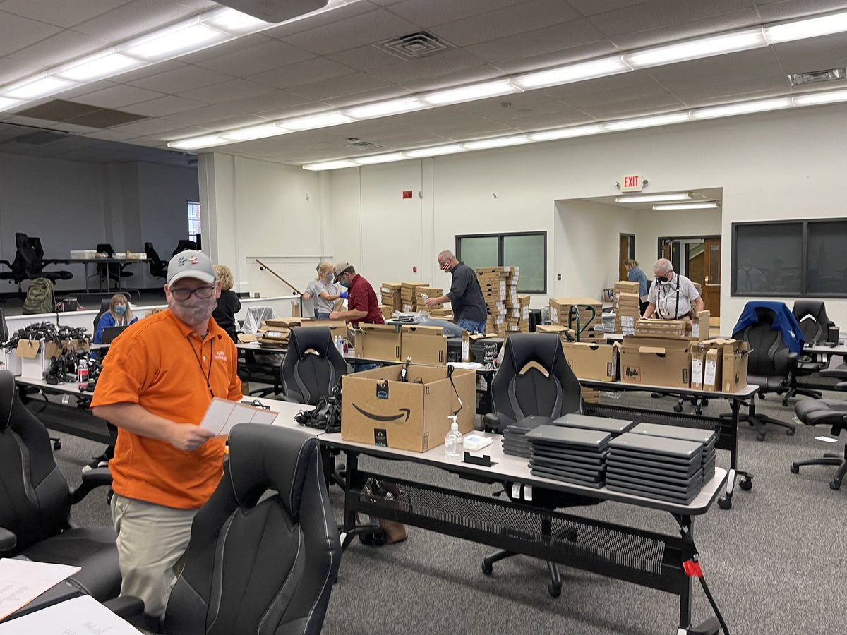 DougWickham's tweet photo. Teamwork makes the dream work @MCPSTechnology! Chromebooks to unbox, enroll, label, and deliver for our @mcps_va first, second, &amp; third grade students thanks to ECF.  @FCC #Techsauce https://t.co/9wvrdINDrY