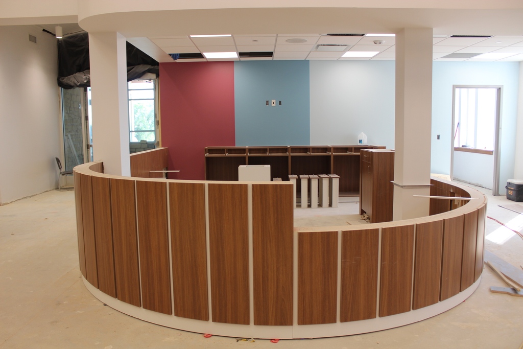HuntleyLibrary's tweet photo. The Information and Check-out desks are built, the walls are painted, and the floors are currently being installed. We... are... almost... there! #library #construction #renovation https://t.co/hHdgih2kS7