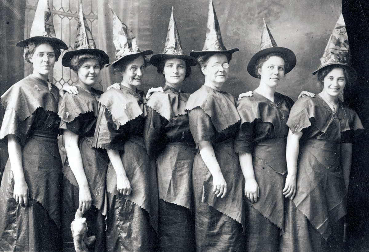 orangehistorync's tweet photo. New Sat. craft alert! Engage in the tradition of dressing-up for what started as an ancient harvest festival, and evolved into Halloween as we know it. Make your own witch or wizard hat! Peek at this photo from 1910 showing handmade witch costumes. Photo: Getty Images https://t.co/iQ4lDJlcPw