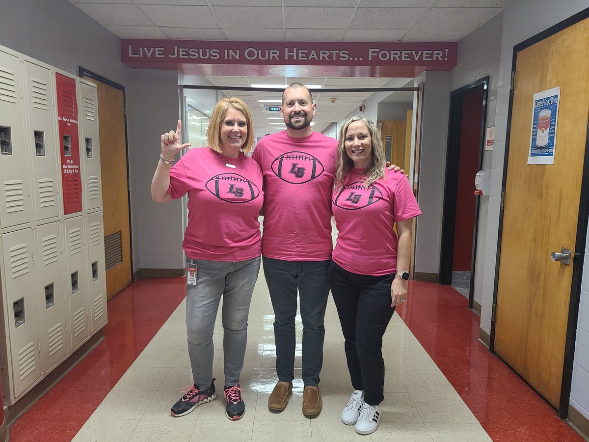 LaSallePride's tweet photo. The Marketing/Admissions team is proud to support the @Forever49Found today in their #pinkout shirts. Good luck tonight, Lancers! #LRD @LS_LancerATH @LS_LancerFB https://t.co/9HqFuZTHQI