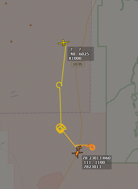 ameliairheart's tweet photo. YEH-60 78-23013 and miscoded UAV with a Moroccan hex code active again over Yuma Proving Grounds, both seeming to have departed from Castle Dome Army Heliport, a popular site for UAS testing. #ADSB #0200F3 #AE21C1 https://t.co/adaQZ0VeYE