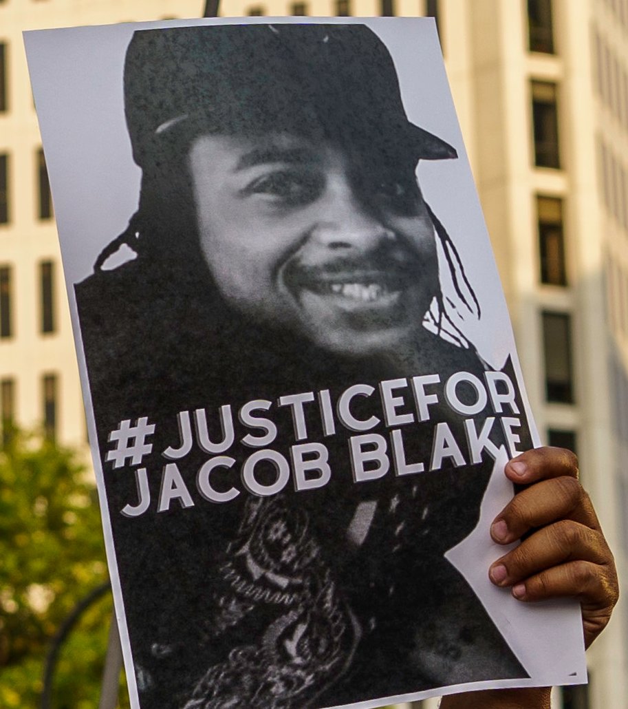 ajplus's tweet photo. BREAKING: The DOJ will not pursue federal civil rights charges against the Kenosha police officer who shot #JacobBlake.

Rusten Sheskey shot Blake 7 times in the back in front of his children, paralyzing him from the waist down. State prosecutors also declined to charge Sheskey. https://t.co/UvJzk89Xpb