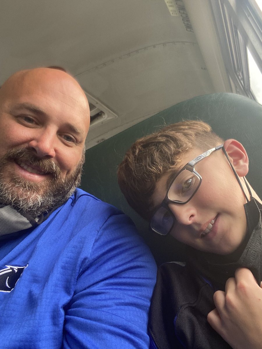 tritonqbacademy's tweet photo. Friday nights on a bus just hit different with this kid. Heading to Englewood to take on Northmont. #MyAssistantCoach #LoveHim https://t.co/TKyt1s1Kaz