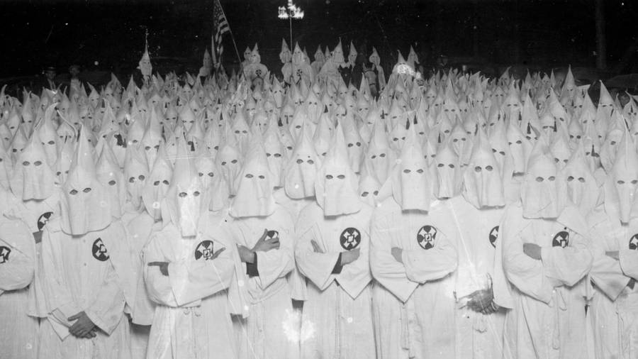 DeathBattleBot's tweet photo. DEATH BATTLE! Raj Koothrappali VS Ku Klux Klan https://t.co/eZIZTv4w7n
