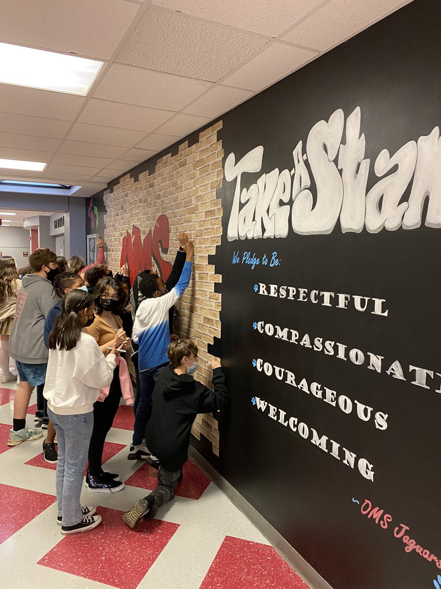 Dr_MCarlson's tweet photo. Another great bullying prevention kick off event at @OrefieldMS! Students and staff engaged several community-building activities such pledging to be respectful, compassionate, courageous, and welcoming. #ParklandPride https://t.co/Txdhp3l6l7