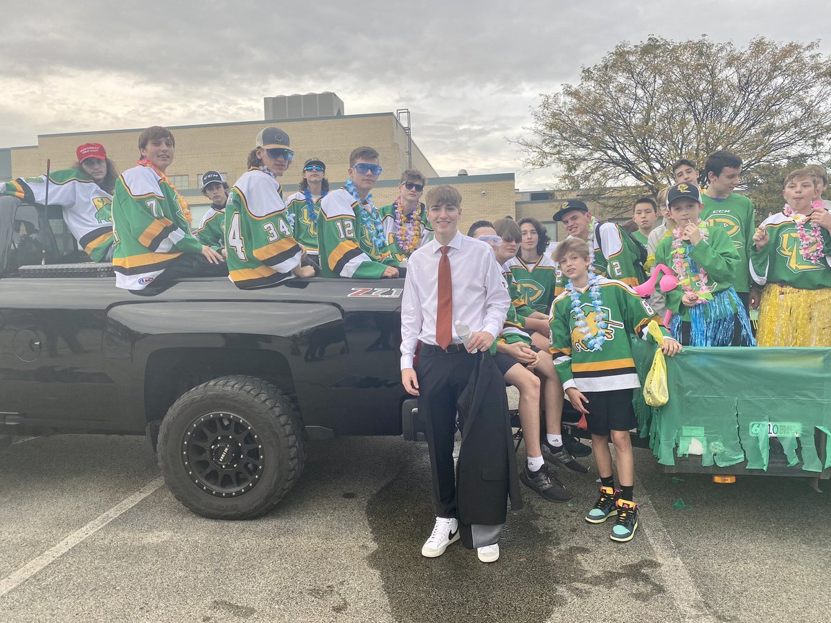 DeerLakesHockey's tweet photo. 2021 Deer Lakes Homecoming via Deer Lakes Hockey vibing to the flow of #tropocalglow. Ready to cheer on our Lancers to a victory against Burrell #GlowUp #DLHOCO2021 #BeatBurrell #rainraingoawaycomeagainanotherday https://t.co/IlBy8lt7Th