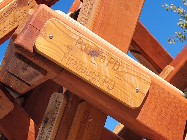 SouthTahoeNow's tweet photo. Redwood art piece installed in #SouthLakeTahoe as tribute to the 300+ agencies who saved &amp; protected the community during the #CaldorFire. All names engraved on the art . This replaces #turnedwork art of #Malcolm Tibbets that was destroyed by vandals.  https://t.co/2iecniPQbI https://t.co/a2mBlf3iQs