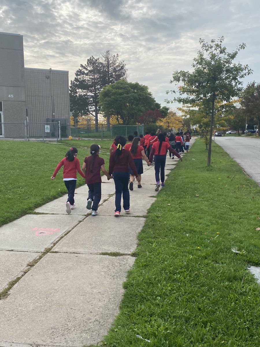 Ms_NatYoung's tweet photo. The grade 2 and 3/4 class joined together (wore red!) and walked around our school community in honour of Terry Fox. A great way to end off the school week! @TerryFoxCanada ❤️👟 #StDTeam https://t.co/bazxHVaWIp