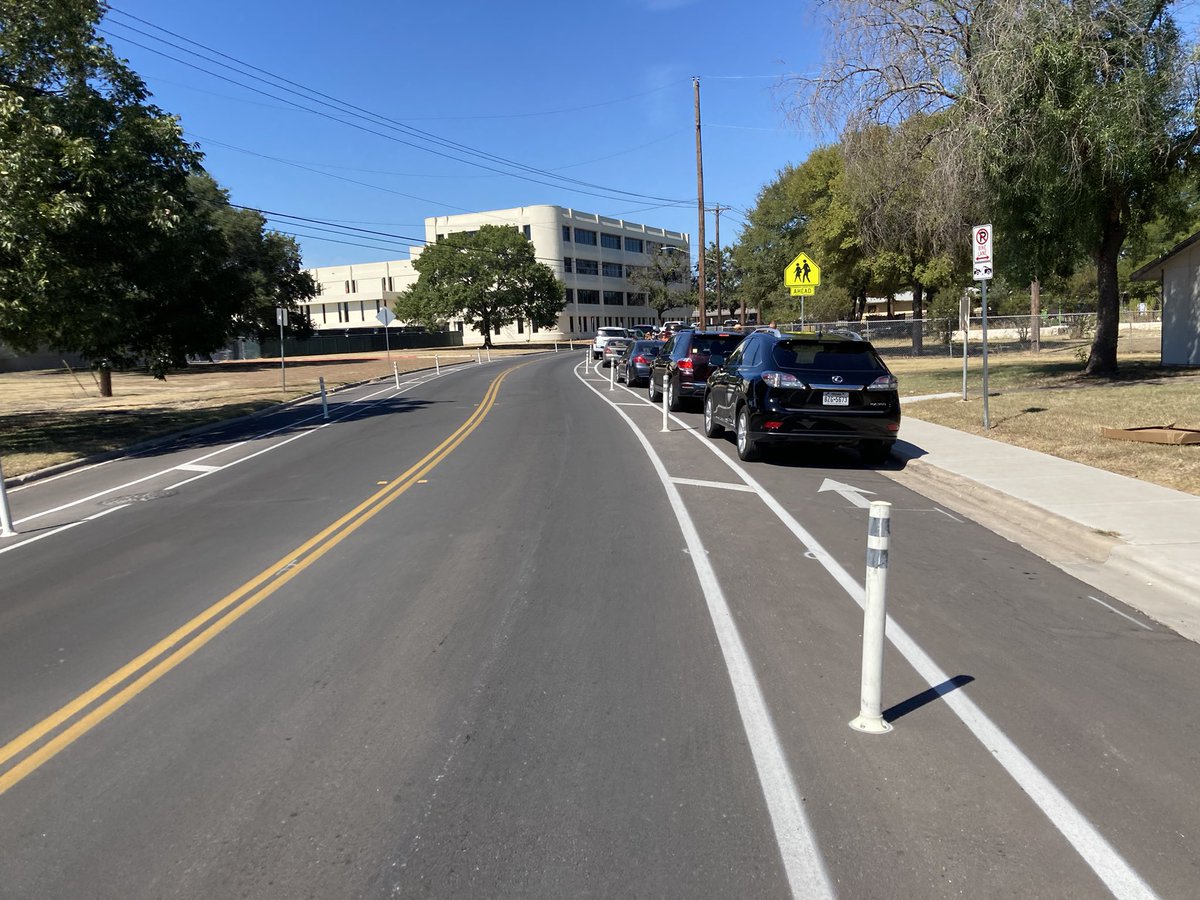 soc4austin's tweet photo. Hey @austinmobility can we get these barriers for our protected bike lanes?

One bollard every ten feet just invites cars to use the lane for parking like in the photo below https://t.co/QNJ8wQWESL