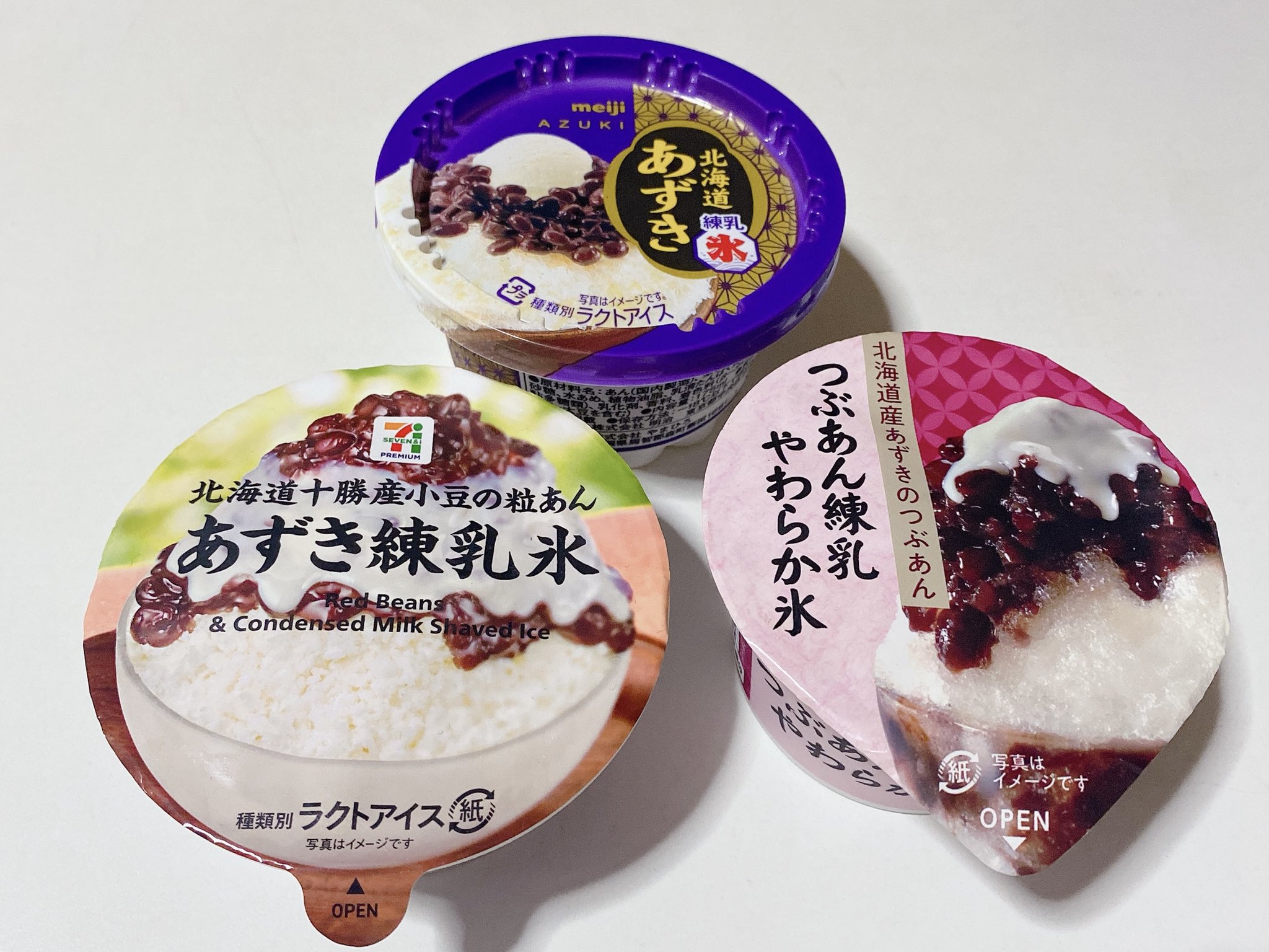 あんこさがし セブンとファミマとローソンのあずき練乳氷の食べ比べ セブンプレミアム あずき練乳氷 赤城乳業 つぶあん練乳やわらか氷 明治 北海道あずき練乳氷 ふわふわで繊細な氷の質感はファミマ 練乳のコクと甘みの強さではセブン 小豆の存在感と