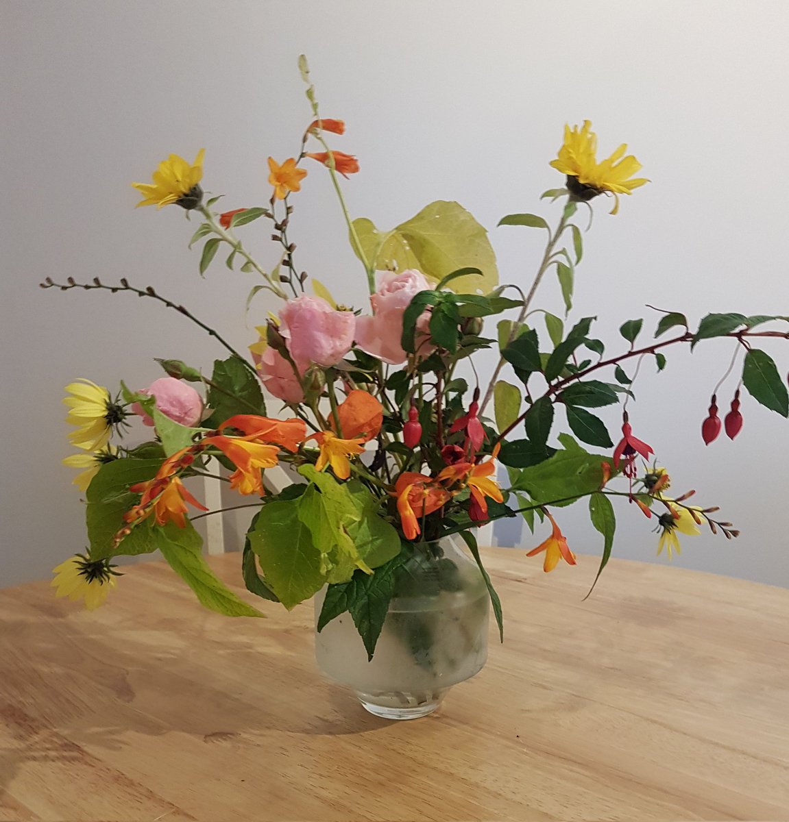 Susan_Maxwell_'s tweet photo. Autumn flowers from our garden brightening a wet day.  Think my #COVID is finally going, however it's parting gift today is that my lungs feel like they are filled with concrete. Be glad to see the back of this particular disease.
#beatcancer 
#beatingcovid https://t.co/HWYjx1rime