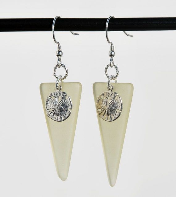 KarmaKittyJewel's tweet photo. #Sanddollar #Recycled #seaglass #beach #etsyhandmade #etsymntt #etsysocial #alexpals #beachjewelry https://t.co/6sxlUd5tW5 #freeshipping #beachjewelry #recycledglass #upcycled #bohochic #EtsySeller #etsystore #etsygifts #handmadejewelry #sale #save20 #summersale #onsale #shopsale https://t.co/d3YDkE2IRh