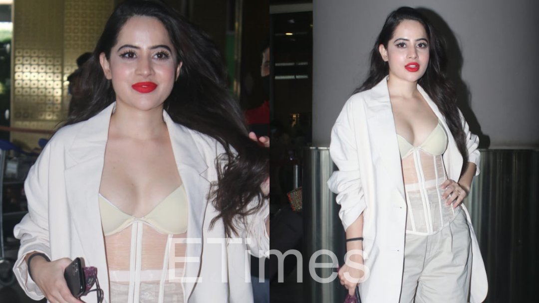 ETimesTV's tweet photo. .@urf7i turns heads in her all-white #airportlook. This time the #biggbossott star was spotted in a white corset pair with white pants an blazer.

#urfijaved https://t.co/1QzSeXM2eQ