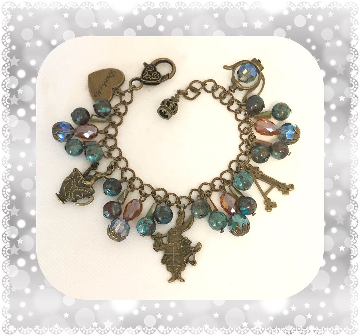 Alice themed charm bracelet available to post #Aliceinspired #alicejewellery #pirateswag #ooakjewellery #charmbracelets